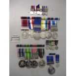 A large group of British mid 20th century Service medals, clasps, miniatures and bars all with the