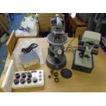 C. Baker of London microscope, a Russian MBC-10 stereo microscope with additional lens and an A.C