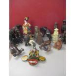 Reproduction tourist pieces from around the globe to include a Verdigris metal Egyptian figure on an