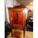 Edwardian inlaid mahogany pot cupboard with extended back, single door with internal shelves, on