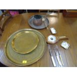 A mixed lot to include Indian brass trays, copper items, a wall barometer and other items