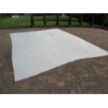 A very large rug 470cm x 360cm having a mottled grey and cream weave with a grey piped border,