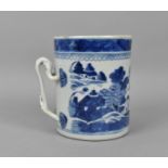 A Chinese export blue and white porcelain 'Nanking' tankard, the body depicting pagodas and pine