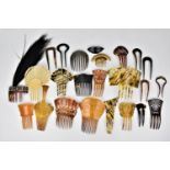 A collection of early 20th century faux and real tortoiseshell hair combs, comprising mantilla