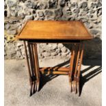 A nest of Edwardian mahogany quartetto tables, in the Regency style, comprising four graduated