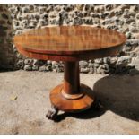 A William IV rosewood occasional table, the circular top above a central column on a circular base