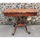 A Regency faux rosewood and ormolu mounted card table, with fold over top (needs fixing) inlaid with