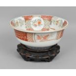 A 19th century Chinese famille verte bowl on hardwood stand, the bowl with slight everted rim