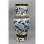 A 19th century Chinese blue and white baluster vase, with crackled glaze and bronze effect