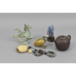 A small collection of Chinese works of art to include a red clay miniature teapot, a carved snuff