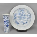 A large 19th century Chinese blue and white charger, with central scene of bamboo, grape vine and