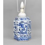 A Chinese late Qing dynasty blue and white porcelain lamp, of hexagonal shape with four clawed