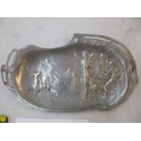 An Art Nouveau pewter dish decorated with embossed hunting scene 39 x 23cm Location: Porters