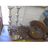 A large Victorian copper pot, a pair of brass wall sconces, a silver plated candelabra, a pair of