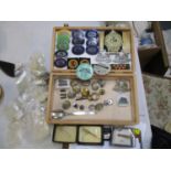 A collection of vintage badges and buttons, together with some vintage foreign coins