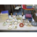 A collection of porcelain to include tea cups and saucers by Royal Albert, Paragon, and others,