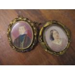 Two Victorian gilt brooches each set with a portrait, one rotating the other with a lock of hair