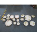 A Royal Worcester porcelain part tea service with 'Pekin' pattern together with a Royal Albert