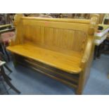 A pitch pine church pew 87.5cm x 125cm x 51cm Location: R.3