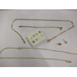 Two 9ct gold chains A/F, marked 375, 3.1g, together with a set of eight yellow metal earrings and