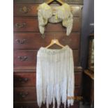 A mid 20th century heavily sequinned belly dancer's 2 piece outfit, the bra top with beaded tassels,