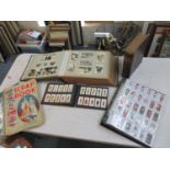 A collection of cigarette cards to include Beatles Warus cards, together with a large photograph