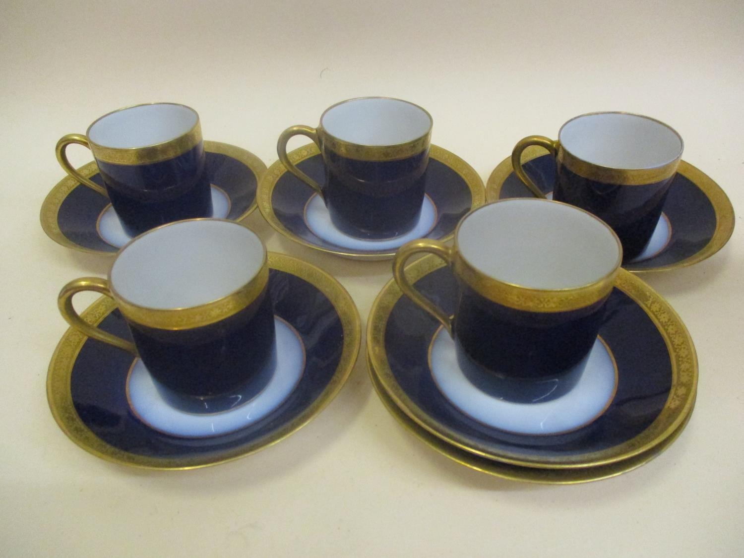 Limoges Double DORURE (double gold) coffee cans and saucers in hand tolled porcelain Location: 5:3