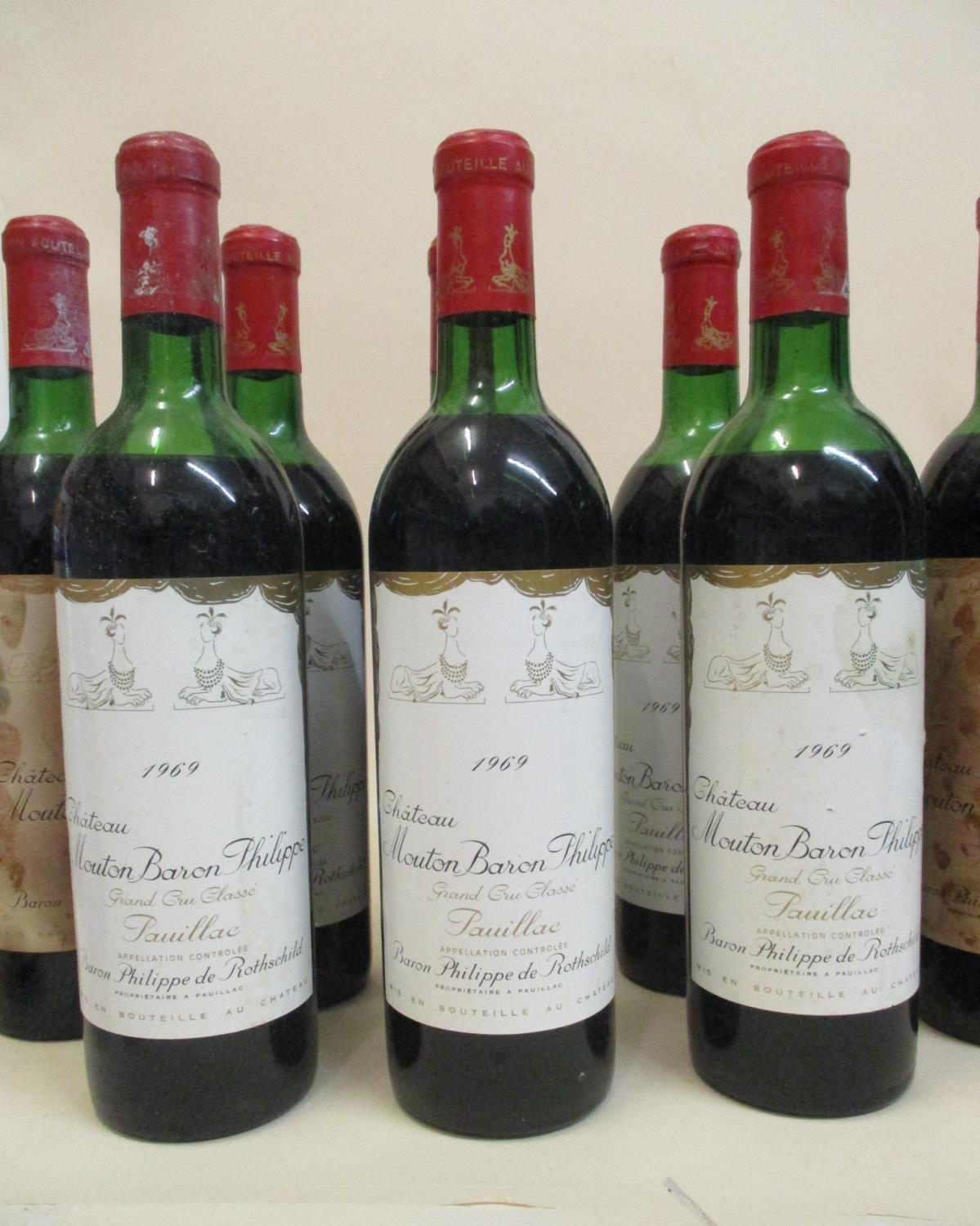 Eight bottles of Chateau Mouton Baron Philippe Grand Cru Classe Pauillac 1969 (two stained labels) - Image 2 of 2