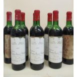 Eight bottles of Chateau Mouton Baron Philippe Grand Cru Classe Pauillac 1969 (two stained labels)