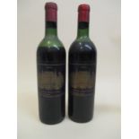 Two bottles of Chateau Palmer 1964 Margaux Medoc Location: L.4