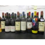 Thirty-three bottles of mixed reds to include Merlot, Bordeaux, Saint Emilion