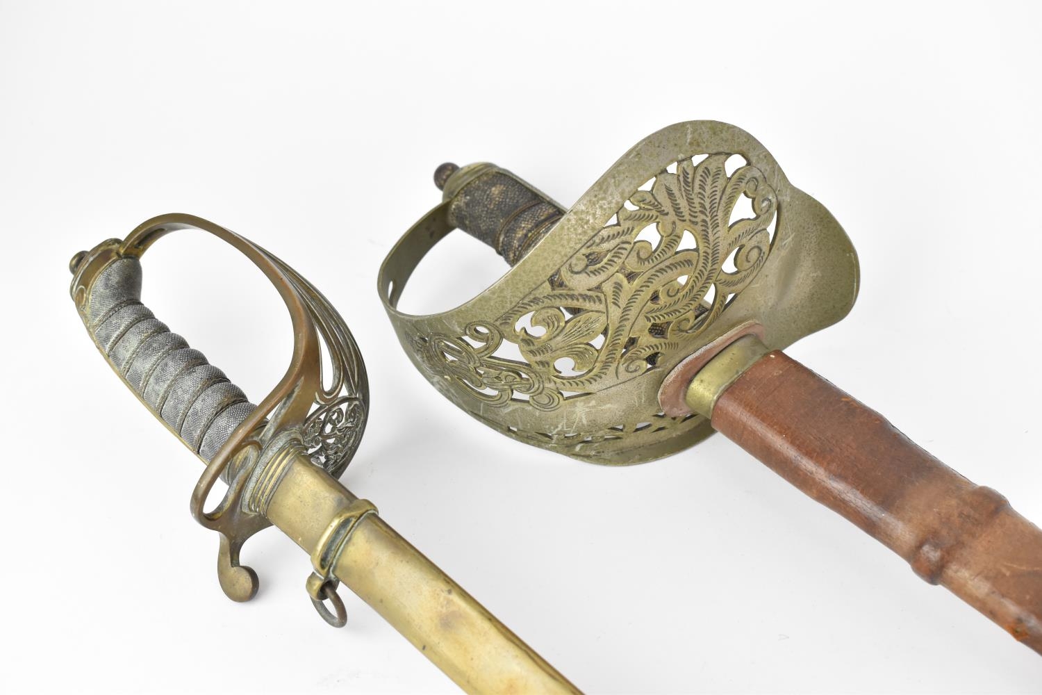 Two British army dress swords, one with leather scabbard, the grip with shagreen and large hoop - Image 7 of 15