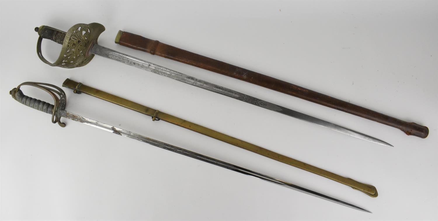 Two British army dress swords, one with leather scabbard, the grip with shagreen and large hoop - Image 8 of 15