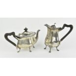 An Edwardian silver coffee pot by Walker and Hall, Sheffield 1904, with matching teapot, both with