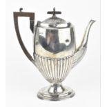 An Edwardian silver coffee pot by Walker & Hall, Sheffield 1901, with part fluted body and lid,