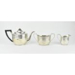 A Georgian Scottish silver three piece tea set by William & Patrick Cunningham, Edinburgh 1802,