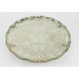 A Victorian silver salver by A B Savory & Sons (William Smily), London 1864, with shaped beaded