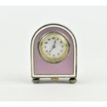 A miniature Austrian silver and enamel timepiece, the case with purple guilloche enamel, white