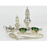 A pair of George V silver salts by Josiah Williams & Co, London 1917, with green glass liners,