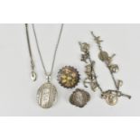 A small collection of Victorian silver jewellery to include two brooches with inlaid rose and yellow