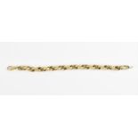 A 9ct yellow gold cable link bracelet with overlapping links, each of them with textured foliate