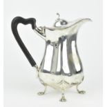 An early 20th century English silver coffee pot by Mappin and Webb, Birmingham 1912, with lobed form