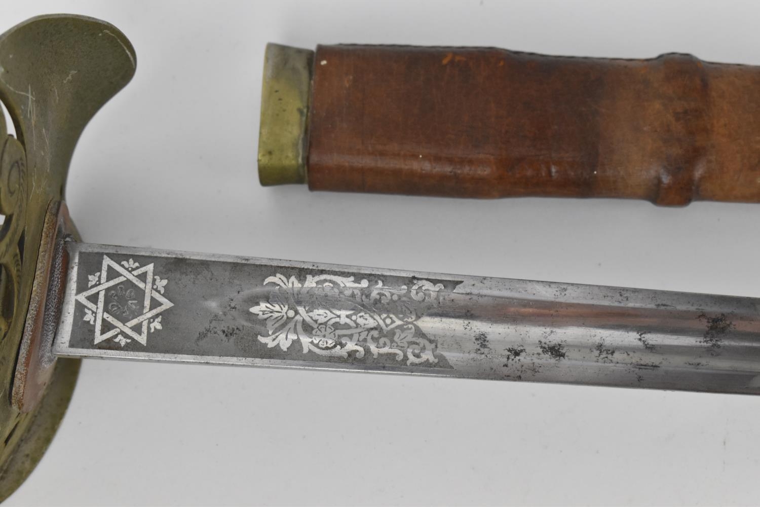 Two British army dress swords, one with leather scabbard, the grip with shagreen and large hoop - Image 10 of 15