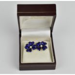 A pair of 18ct gold, diamond and enamel floral earrings, each with blue enamel naturalistic petals