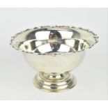 An Edwardian silver footed bowl by Munsey & Co (David Munsey), London 1911, with moulded border with