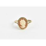 A mid century Elizabeth II 9ct gold shell cameo ring, head and shoulders profile facing left,