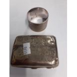 A silver engine turned napkin ring and a silver engraved cigarette case Location: Porter