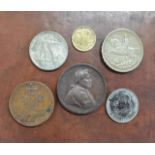 A mixed lot of coins to include a 1935 King George V silver Crown, a copper medal commemorating Pope