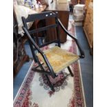 A Victorian ebonized folding campaign chair Location: CL