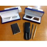 A quantity of pens to include Waterman in pen cases and a silver St. Dupont ball point pen Location: